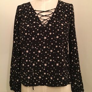 Star print lace-up blouse